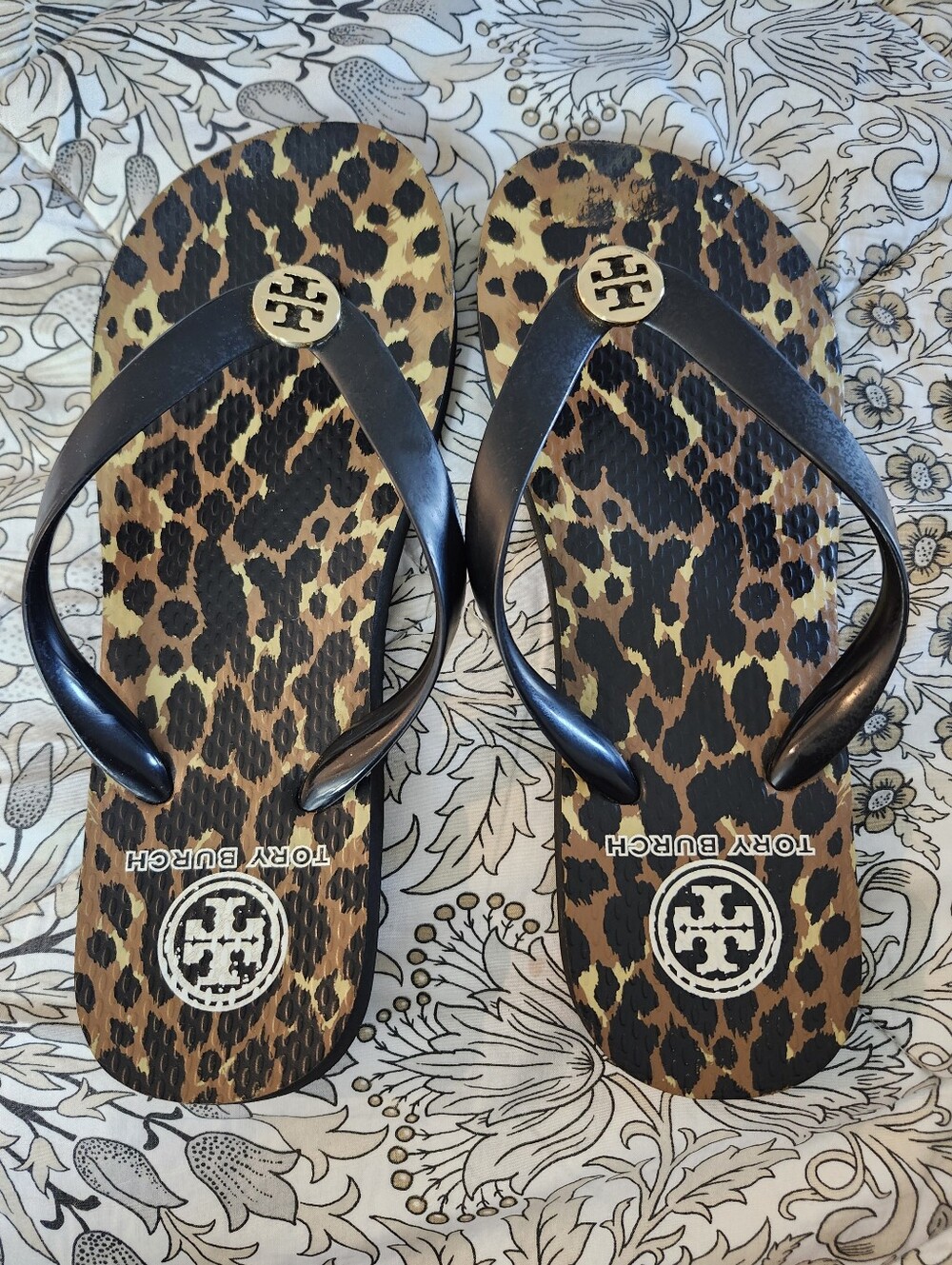 Tory Burch Leopard Print Flip Flops with Black Straps and Gold Logos